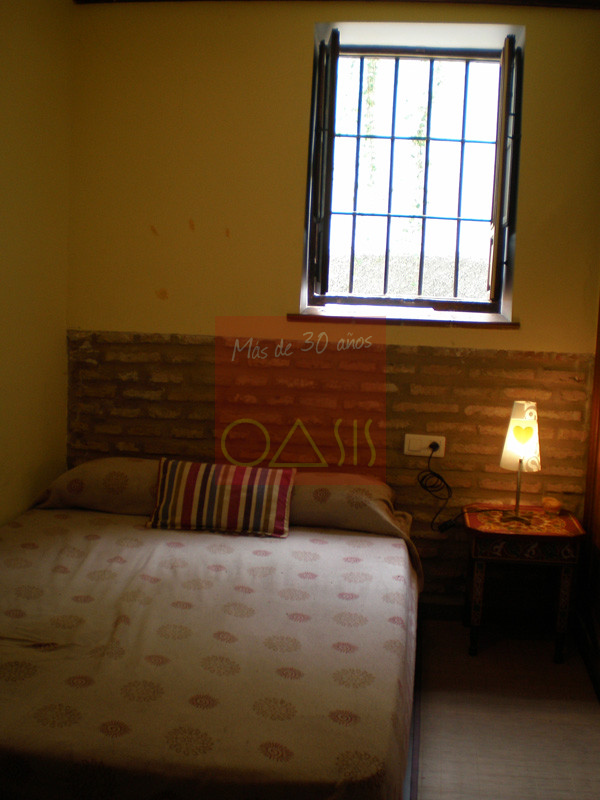 Dormitorio de apartamento en venta en Granada.