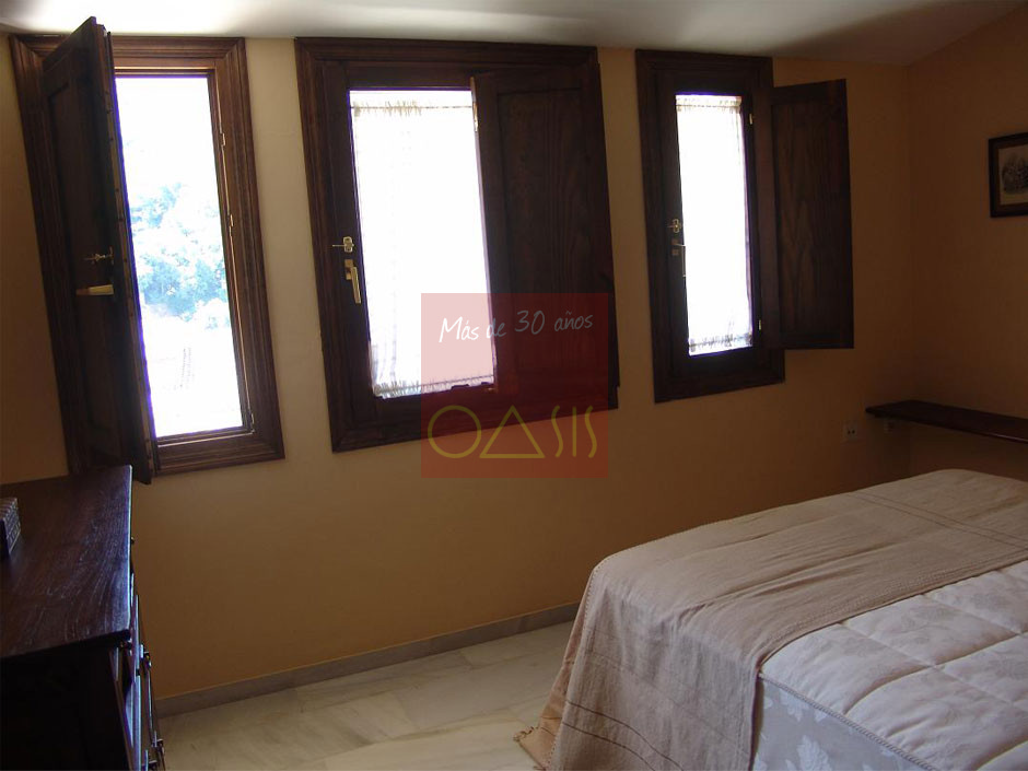 Imagen dormitorio principal en piso en Albacín Bajo